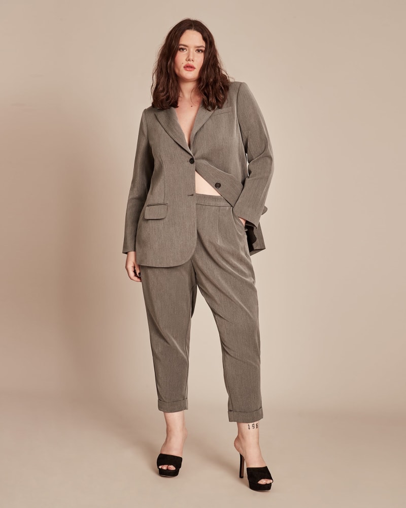 Front of a model wearing a size 12 Destiny Tapered Trouser in GREY by 11 Honoré Collection. | dia_product_style_image_id:290582